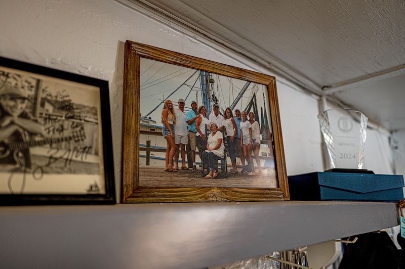 Historic photograph of generations of the Gay family behind Gay Fish Company on St. Helena Island.
