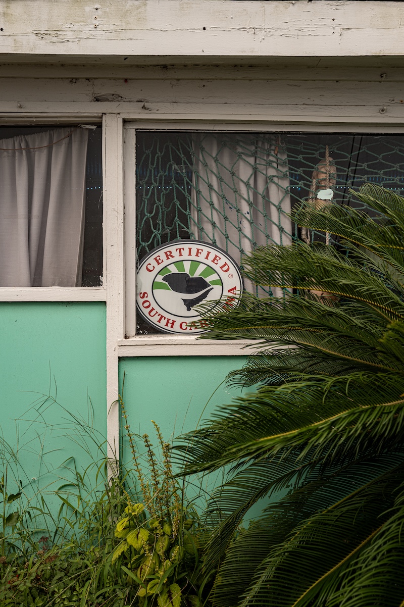 Certified South Carolina sign displayed at Gay Fish Company, a historic St. Helena Island seafood market.