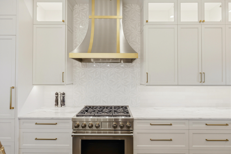 Kitchen stove top and counter with Vent-a-hood full range