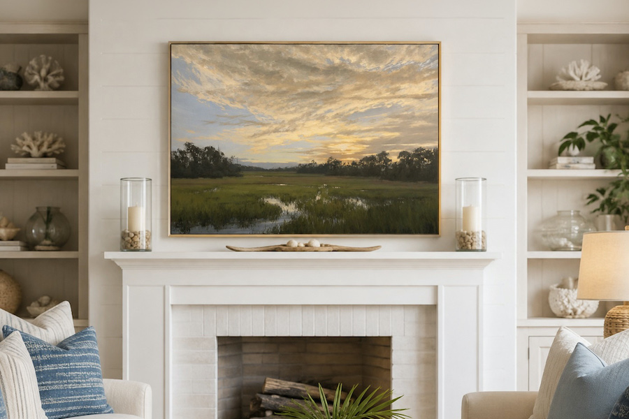 Living room with marshland painting over fireplace