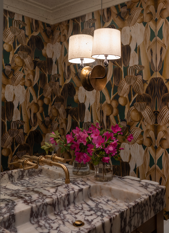 Powder room by Court Atkins Group with frog wallpaper and aubergine marble from Turkey
