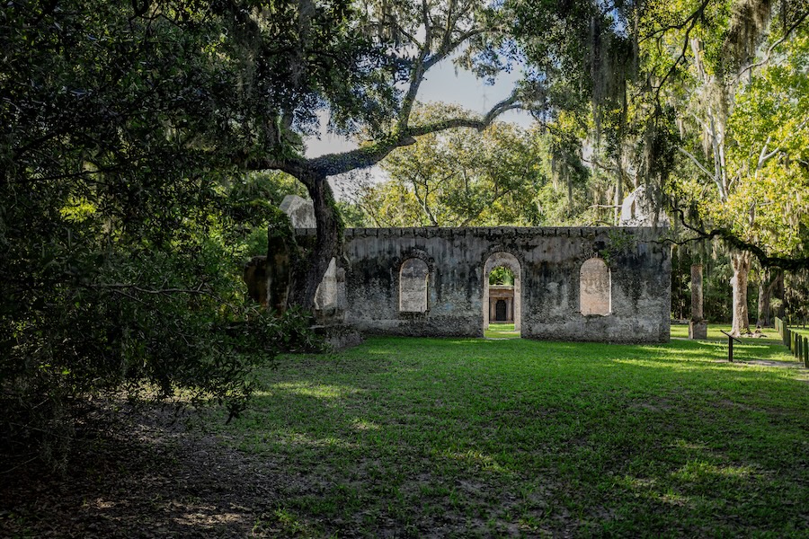Chapel of Ease ruins surrounded by live oaks and greenery on St. Helena Island
