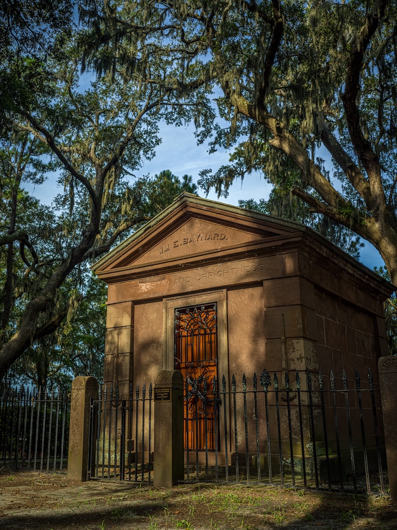 Baynard Mausoleum behind an iron gate beneath live oaks and Spanish moss at Zion Cemetery on Hilton Head Island