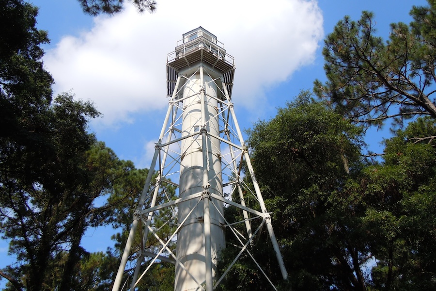 Hilton Head Rear Range Lighthouse standing among trees in Leamington on Hilton Head Island