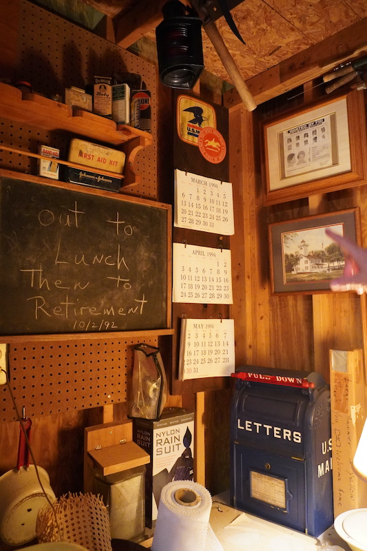 Old mailbox, chalkboard and postal memorabilia displayed in Phil Propst’s shed