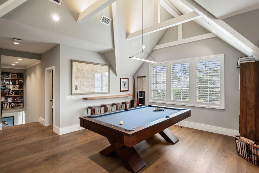 Entertainment suite with pool table and media space at 364 Waterfowl Road