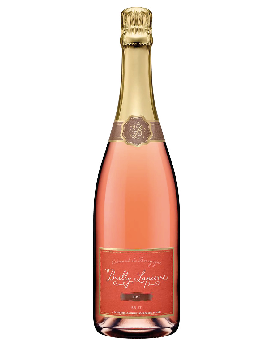 Rosé sparkling wine bottle with pink liquid and a pale label.