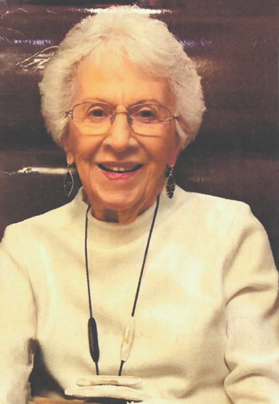 Portrait of Mary Lubeck wearing glasses