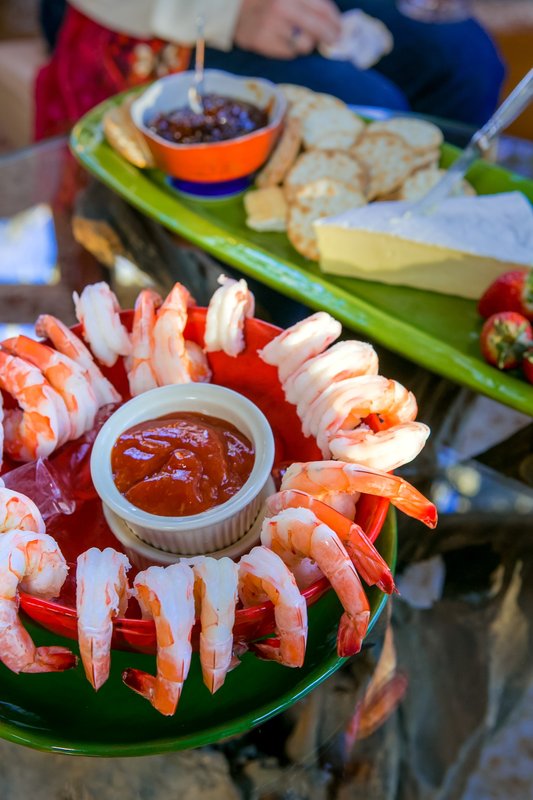Chilled shrimp arranged around a bowl of cocktail sauce